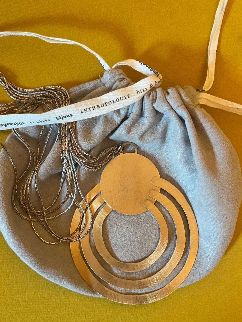 Anthropologie long abstract geometric swirl gold tone necklace